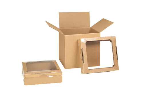 Section d’un emballage Emba-Swing composé d’une boîte extérieure et de deux intercalaires avec film